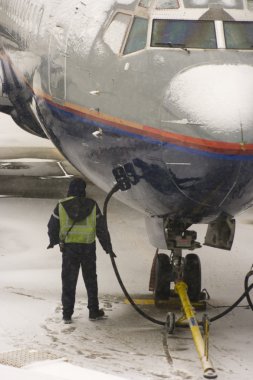 Fueling the aircraft clipart