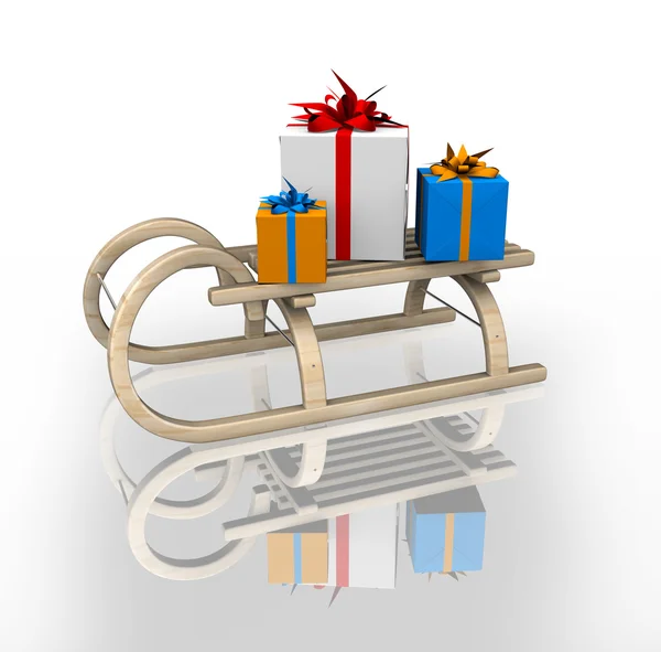 Gift box in sled — Stock Photo, Image