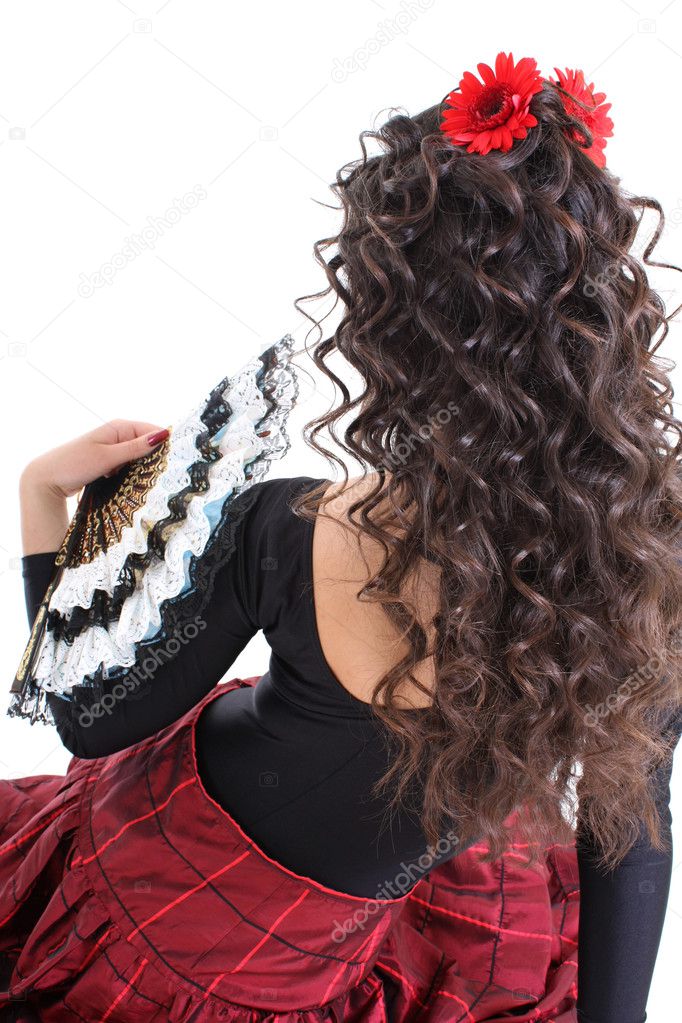 Attractive woman with fan from the back