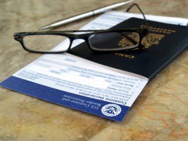 Passport on U.S. declaration card clipart