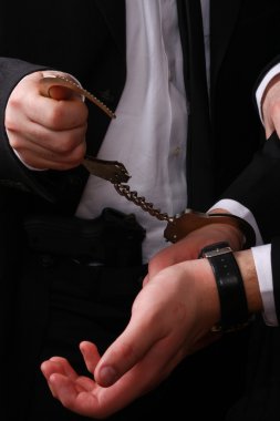 Businessman handcuffed clipart