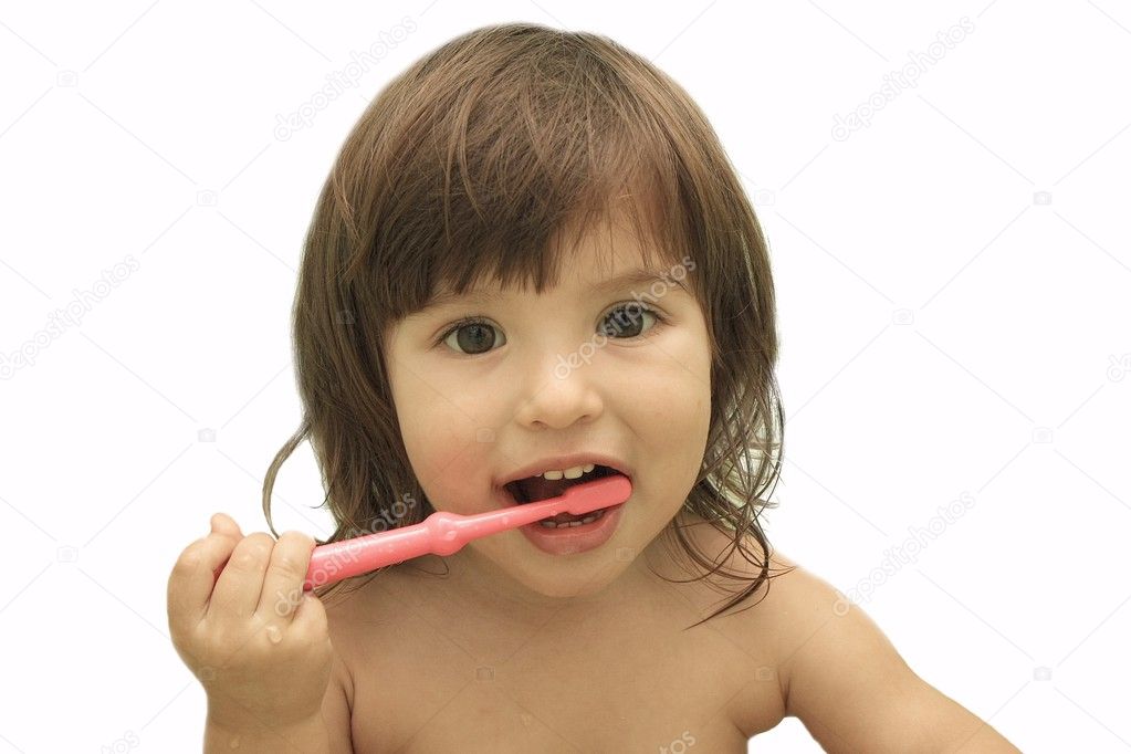 Beautiful girl brushing teeth, isolated on white