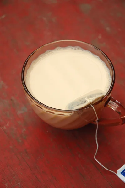 Té caliente con leche —  Fotos de Stock