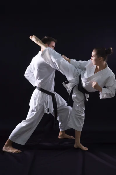 Fighting karate couple — Stock Photo, Image
