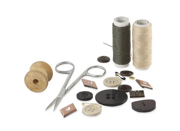 Kit de costura isolado em branco — Fotografia de Stock