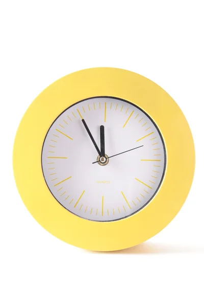 Žluté kulaté analogové hodiny — Stock fotografie