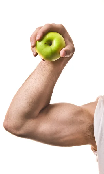 stock image Masculine hand with green apple