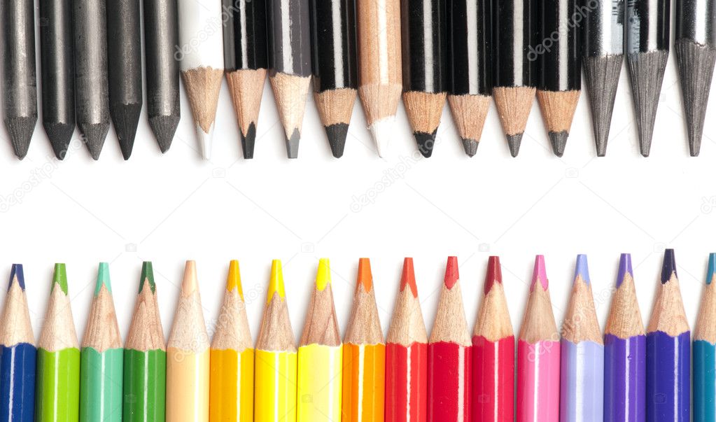 Colored pencils opposing black and white pencils