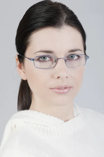 stock image Close-up of a beautiful young woman with glasses