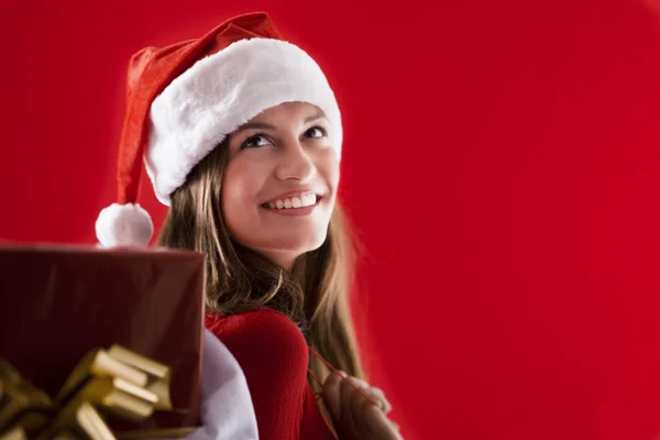 Χαμογελώντας santa κορίτσι με δώρα — Φωτογραφία Αρχείου