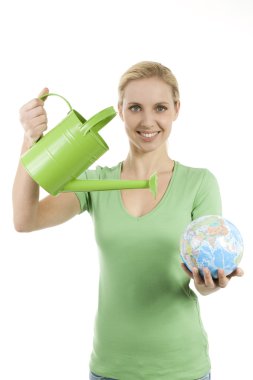 Young woman watering the Earth clipart