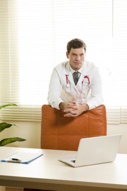 Doctor in his studio clipart