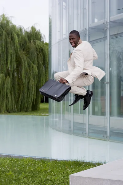 Businessman jumping of happiness — Stock Photo, Image