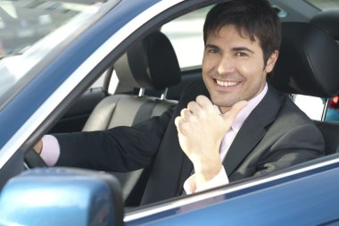 Smiling driver with thumb up clipart