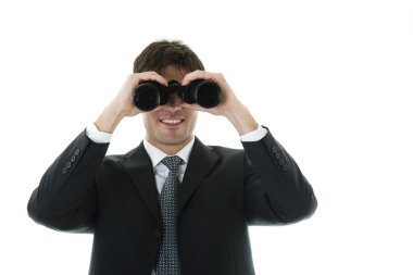 Businessman looking through binoculars clipart