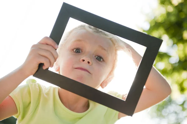 Little girl in frame — Stock Photo, Image