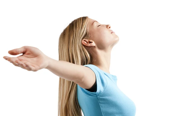 Relaxed young woman with arms outstretched — Stock Photo, Image