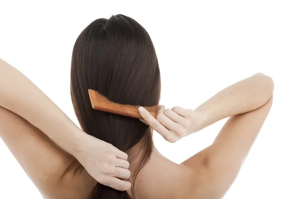Peinar el cabello —  Fotos de Stock