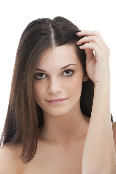 Beauty with hand on hair — Stock Photo, Image