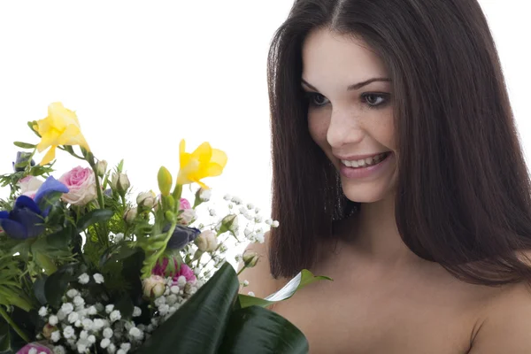 Beauty smelling flowers — Stock Photo, Image