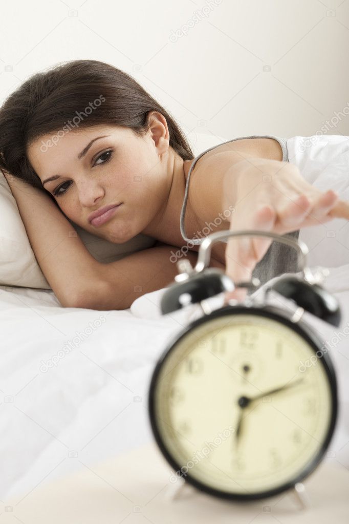 Young woman waking up