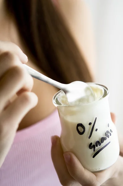 stock image Woman hand with no fat yoghurt