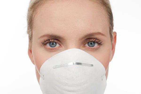 Close-up of a young woman with protecting mask — Stock Photo, Image