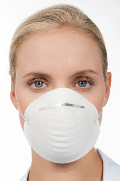 Close-up of a young woman with protecting mask — Stock Photo, Image