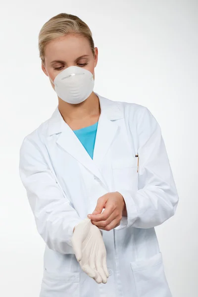 Protective mask and latex gloves — Stock Photo, Image