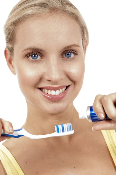stock image A close up of a beautiful woman with toothbrush.