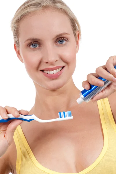 stock image Smiling young woman with toothbrush