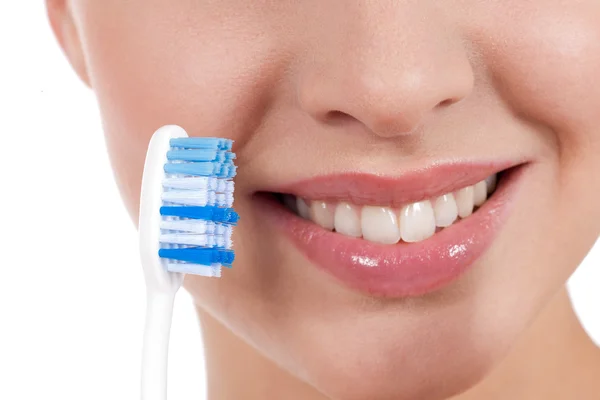 stock image Close-up of a yougn woman smile with toothbrush