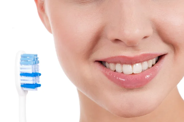 stock image Close-up of a yougn woman smile with toothbrush