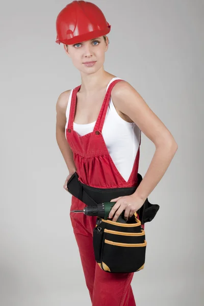 Female handworker with toolbelt — Stock Photo, Image