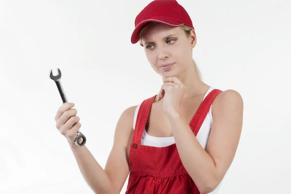 Female handworker with spanner — Stock Photo, Image