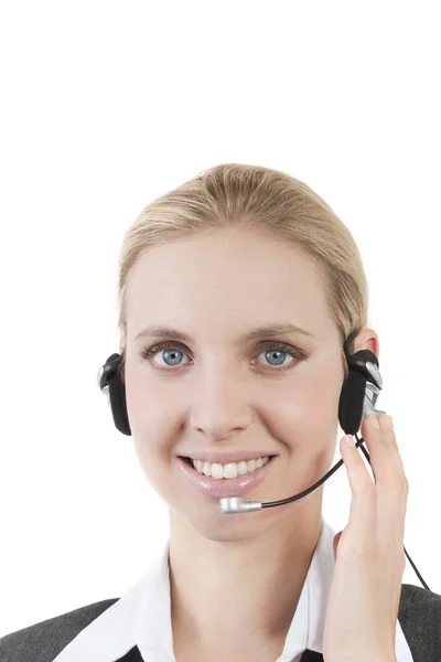 Mulher de negócios falando sobre fones de ouvido — Fotografia de Stock
