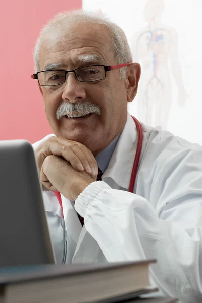 Smiling Doctor using webcam — Stock Photo, Image