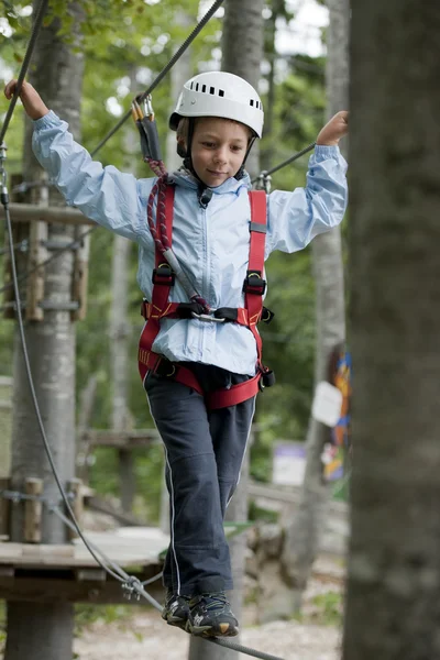 stock image Little boy in adventure park