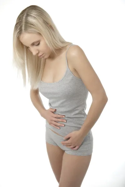 Mulher acariciando sua barriga — Fotografia de Stock