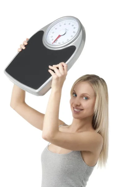 Satisfied woman raising her scale — Stock Photo, Image