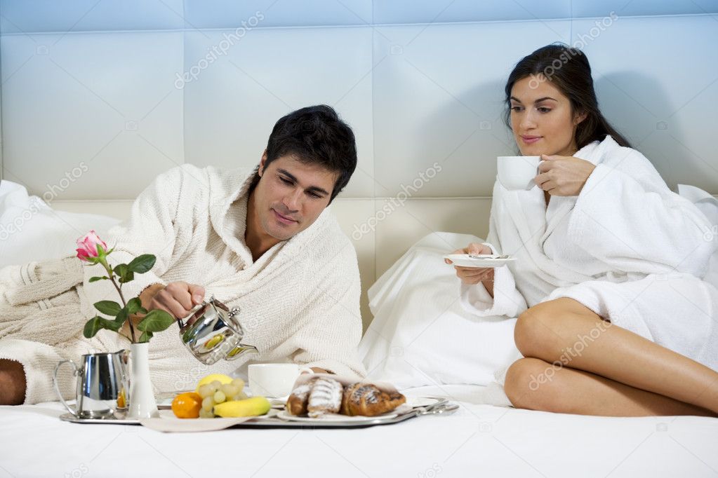 Relaxed Couple in Bed