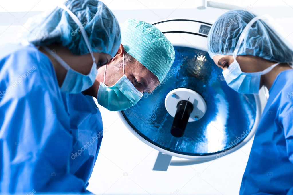 Portrait of team of surgeons at work