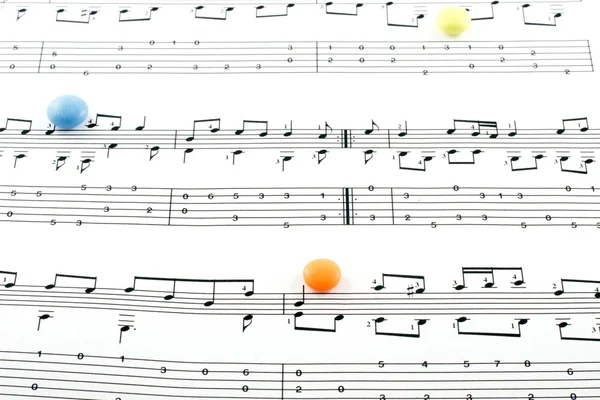 Elementy notacji muzycznej i pigułki — Zdjęcie stockowe