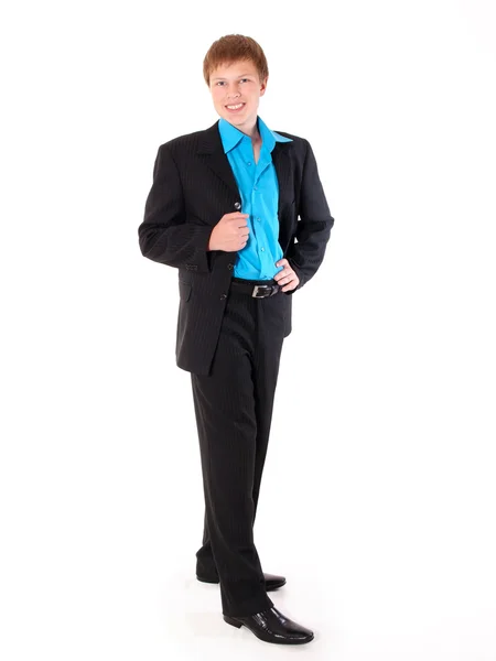 Молодий студент одягнений в чорний костюм Стокове Фото