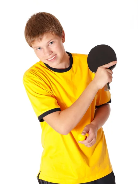 Adolescente em camiseta amarela jogando pingue-pongue Fotos De Bancos De Imagens