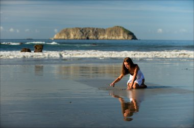 The girl on a beach. clipart