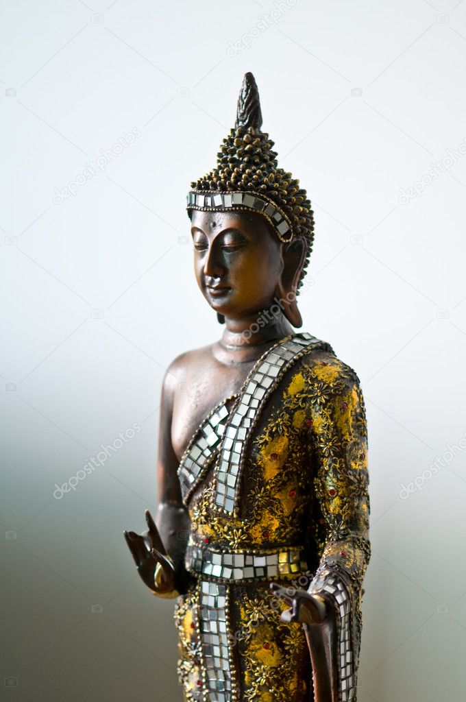 Buddha statue with a golden robe.