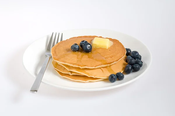 Blueberry pancakes on a plate with fork — Stock Photo, Image