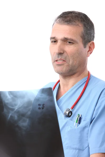 Doctor looking at a xray — Stock Photo, Image