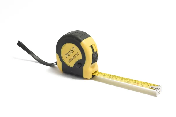Nastro di misurazione giallo su bianco — Foto Stock